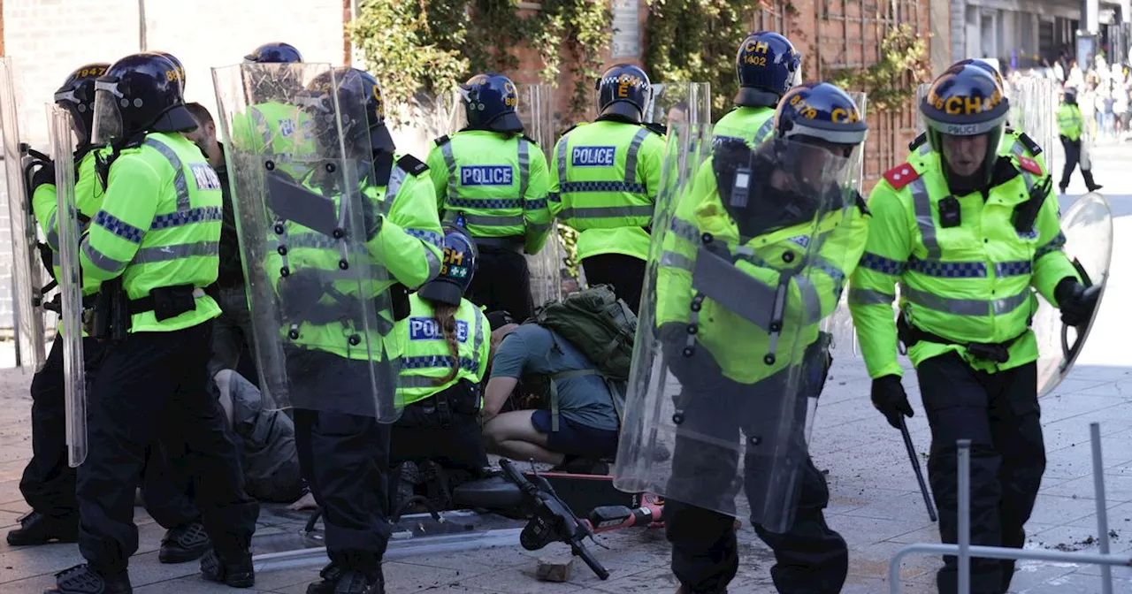 Cops injured in violent protests sas Home Secretary says thugs 'will pay price'