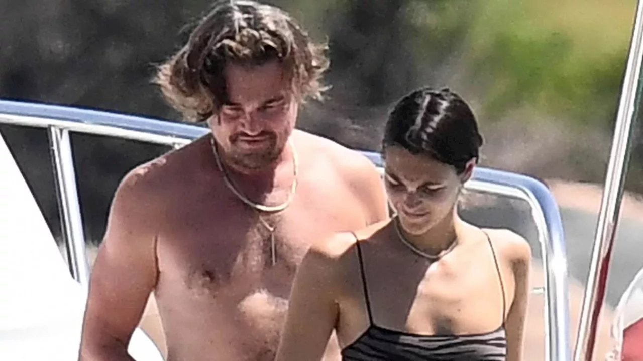 Leonardo DiCaprio, 49, shows off his buff physique with bikini-clad girlfriend Vittoria Ceretti, 26,...