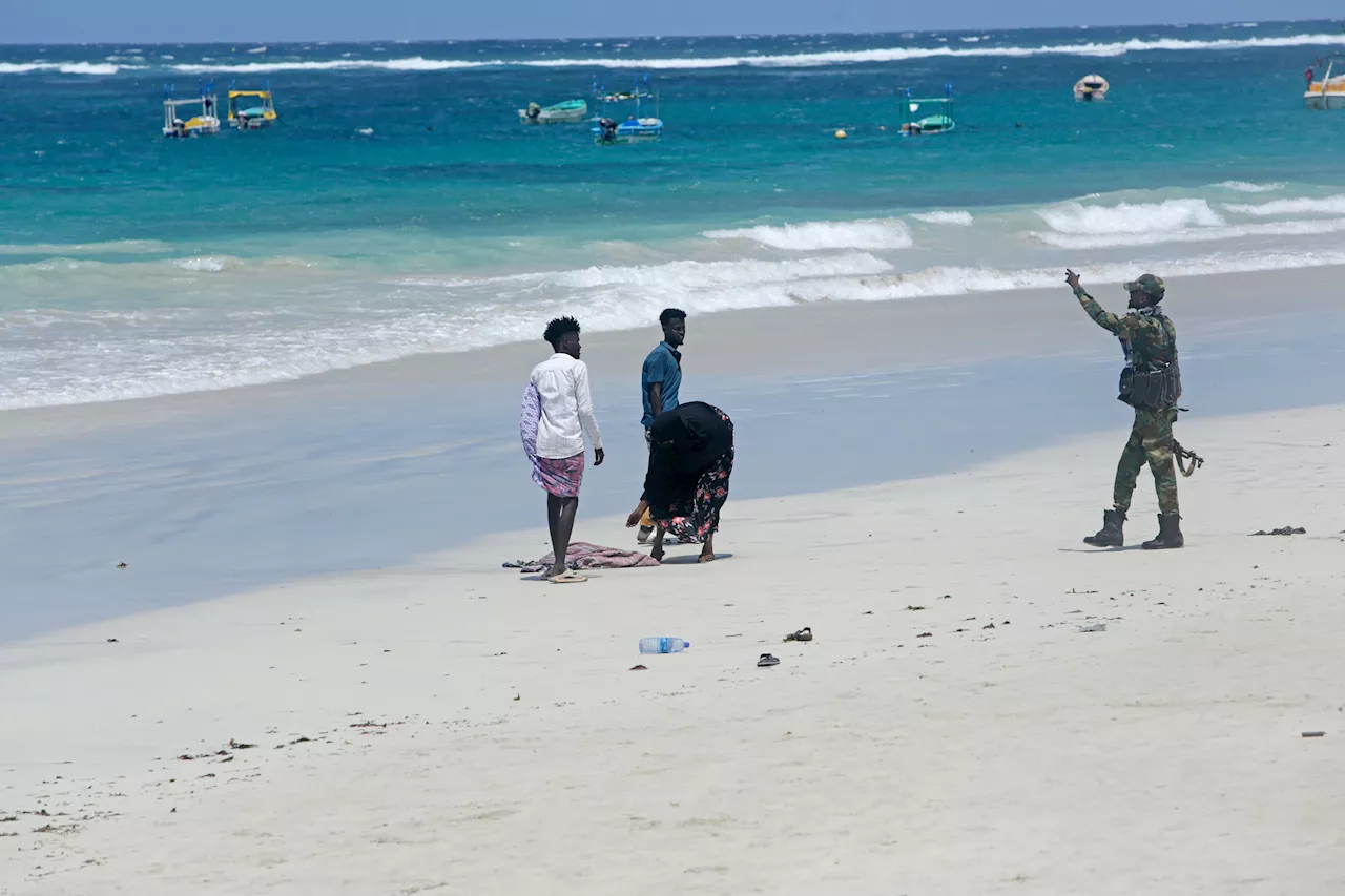 Somali police say 32 people died in an attack on a beach hotel. Al-Shabab claimed responsibility.