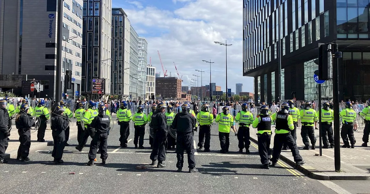 Police officers in hospital and shops looted after violence erupts in Liverpool