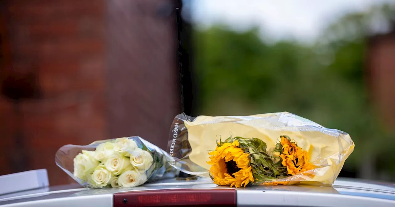 The stark aftermath of tragedy on a suburban street