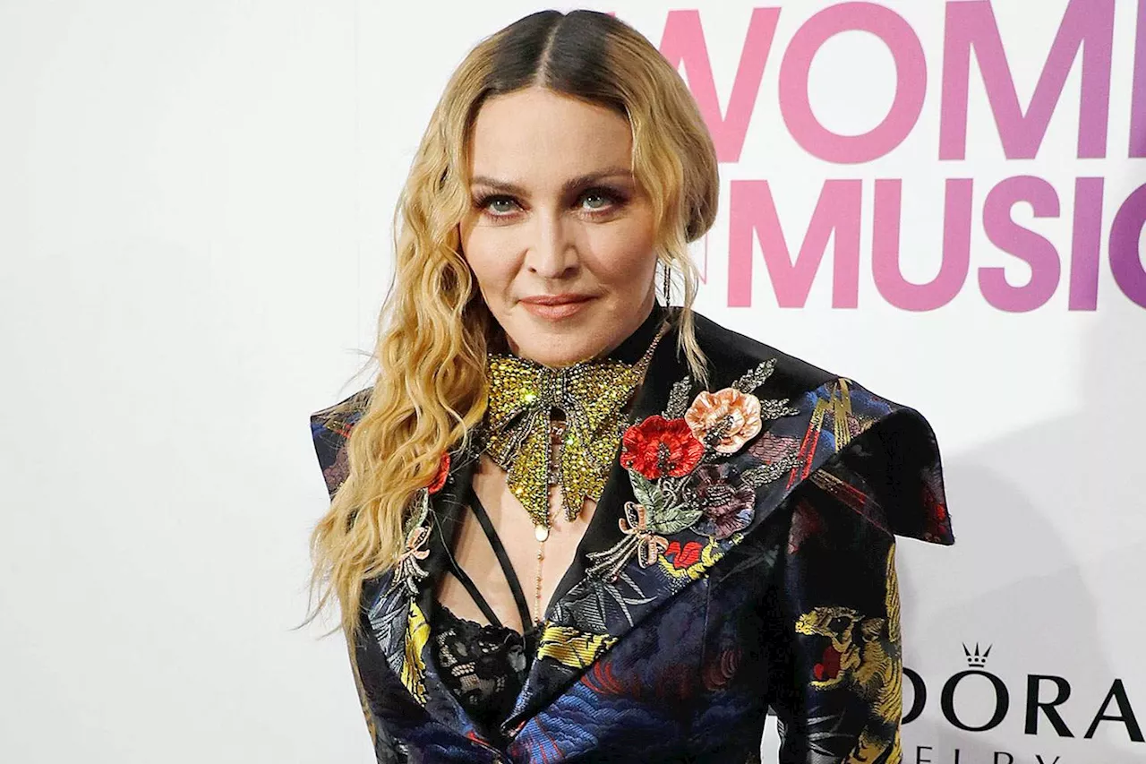 Madonna Poses for Increasingly Risqué Set of Selfies Ending with Topless Photo