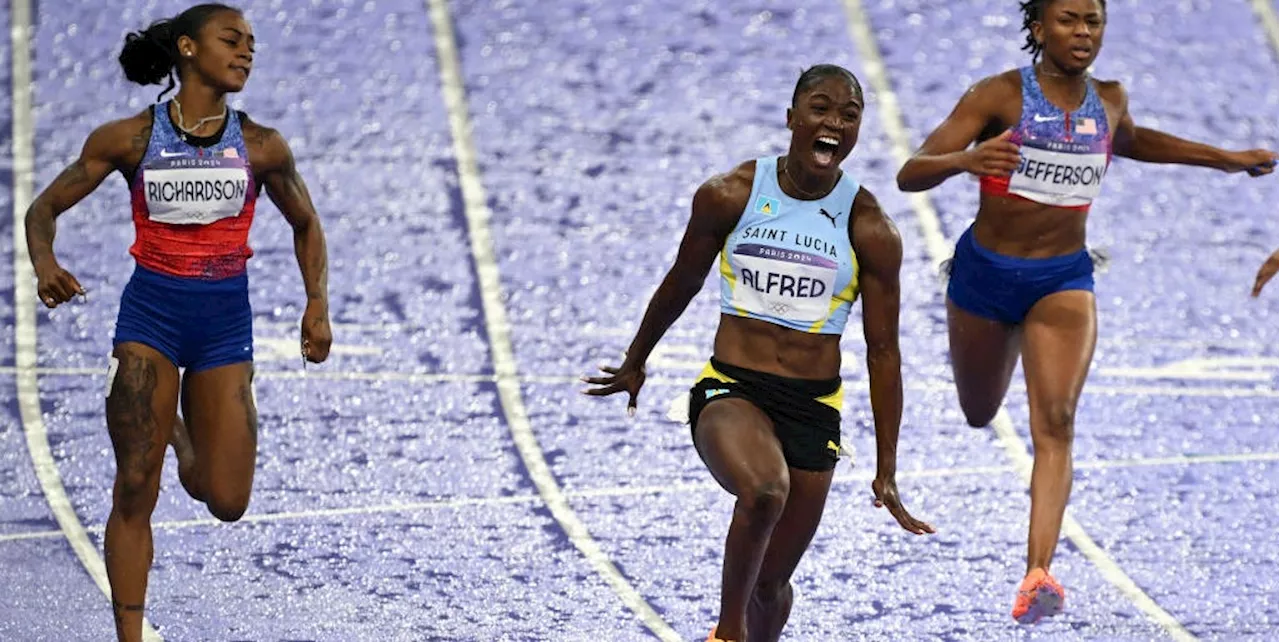 Julien Alfred Upsets Sha’Carri Richardson for 100-Meter Olympic Gold