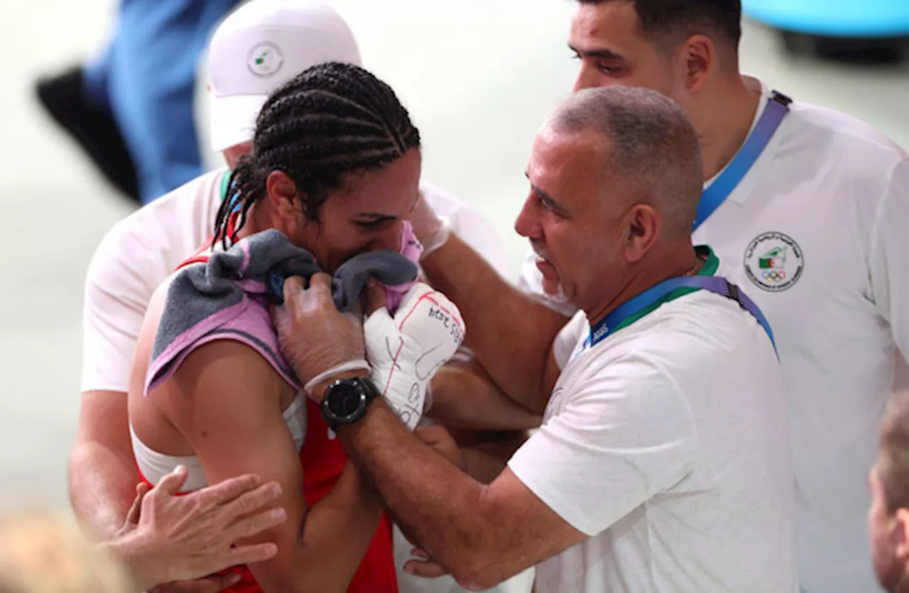 Olympics gender row boxer in tears after winning at least bronze