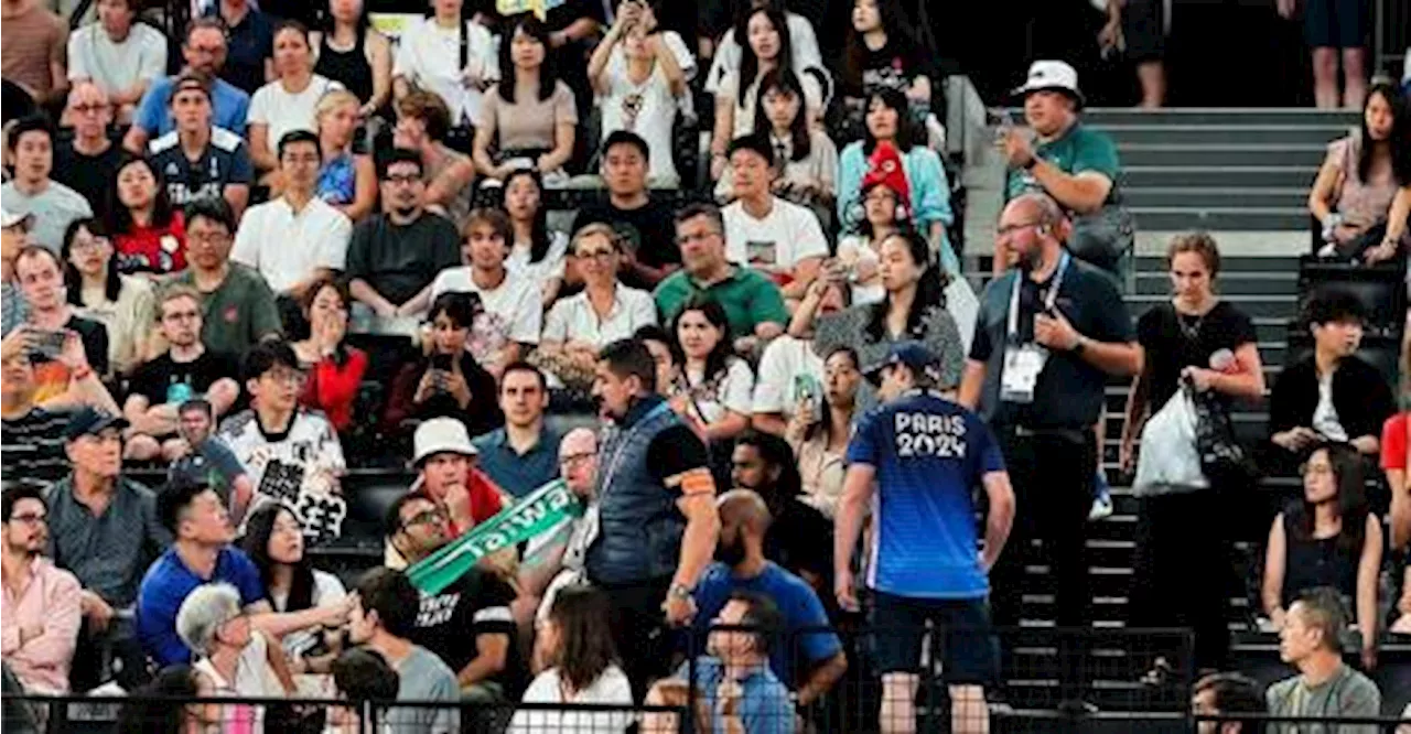 Olympics-Badminton-Spectator dragged from arena for holding up Taiwan banner