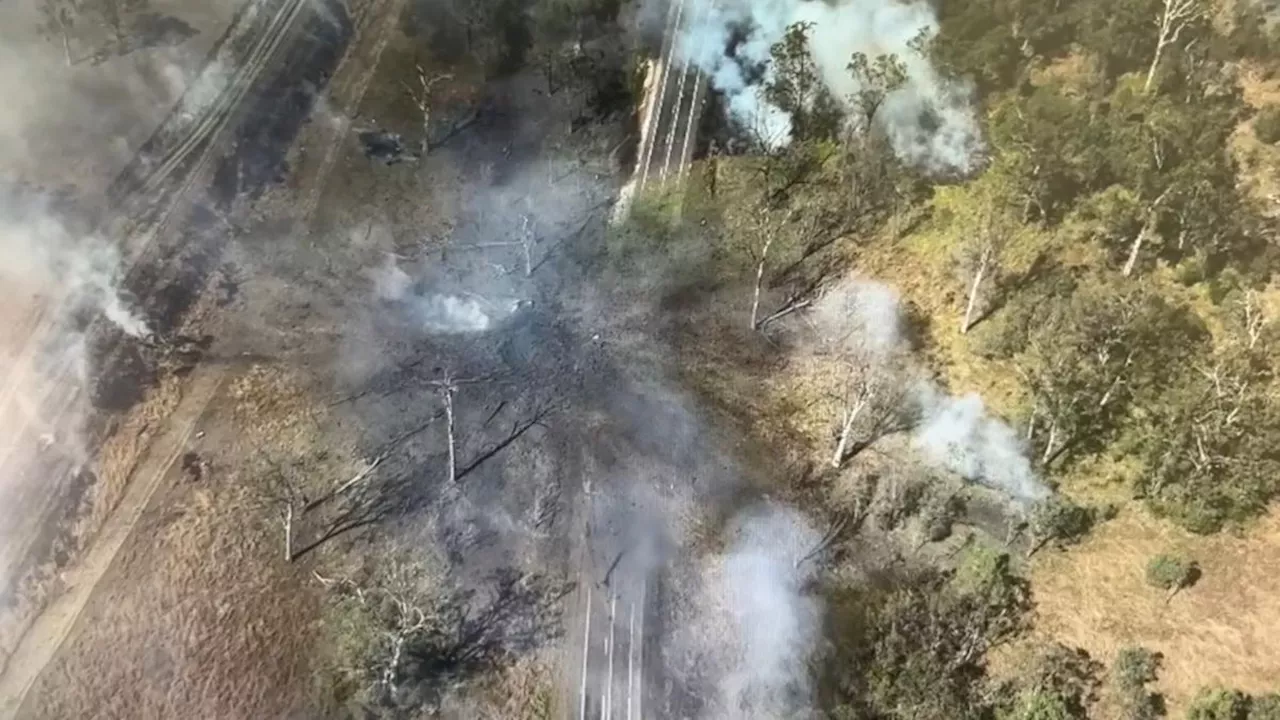 Drone footage reveals massive damage to Bruce Hwy at Bororen in chemical truck explosion