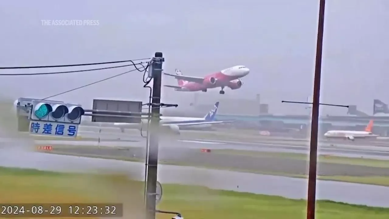 Planes struggle to land at Japan’s Fukuoka airport as Shanshan brings strong winds, heavy rain