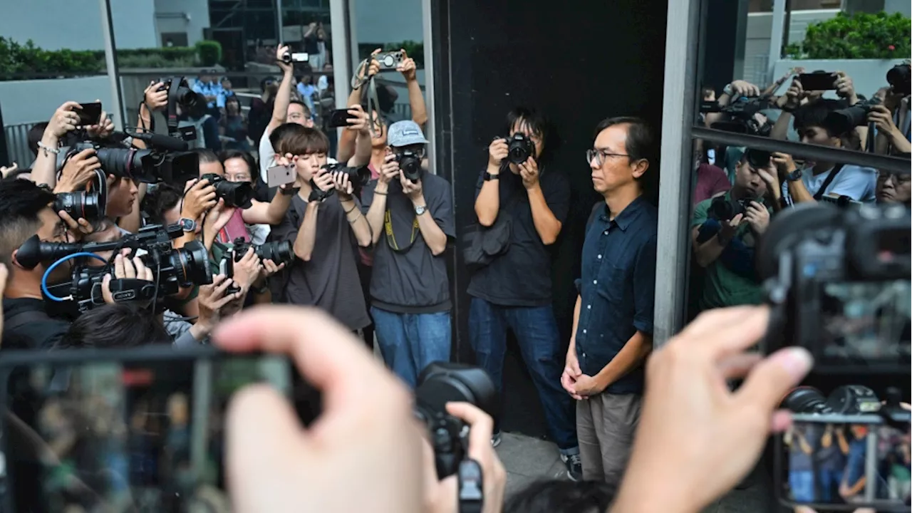 A Hong Kong court convicts 2 journalists in a landmark sedition case