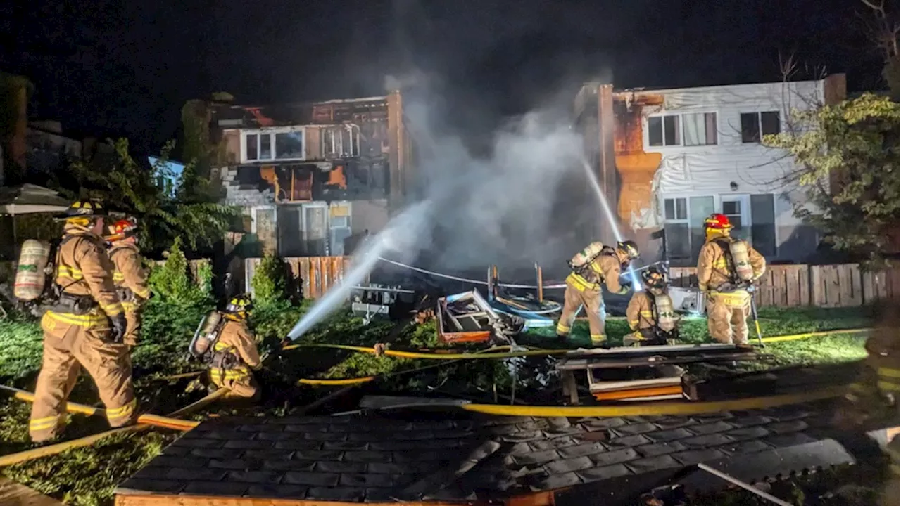 Three-alarm fire damages three townhomes, displaces 16 residents in Nepean