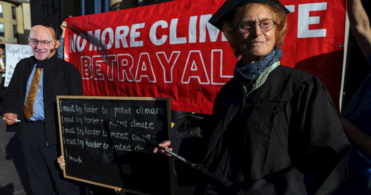 John Swinney's schoolteacher among climate protesters outside SNP conference