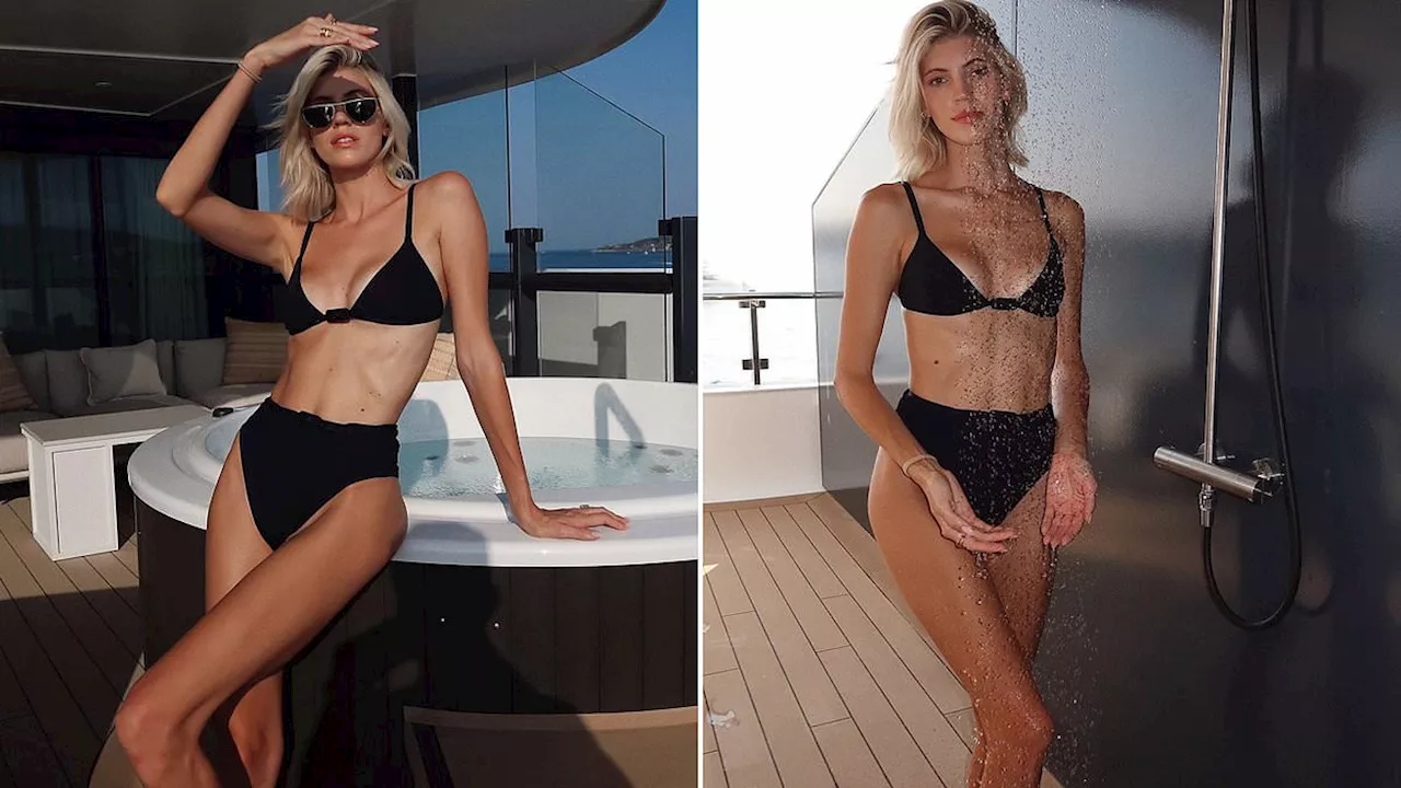 Devon Windsor, 30, shows black bikini while in St Tropez