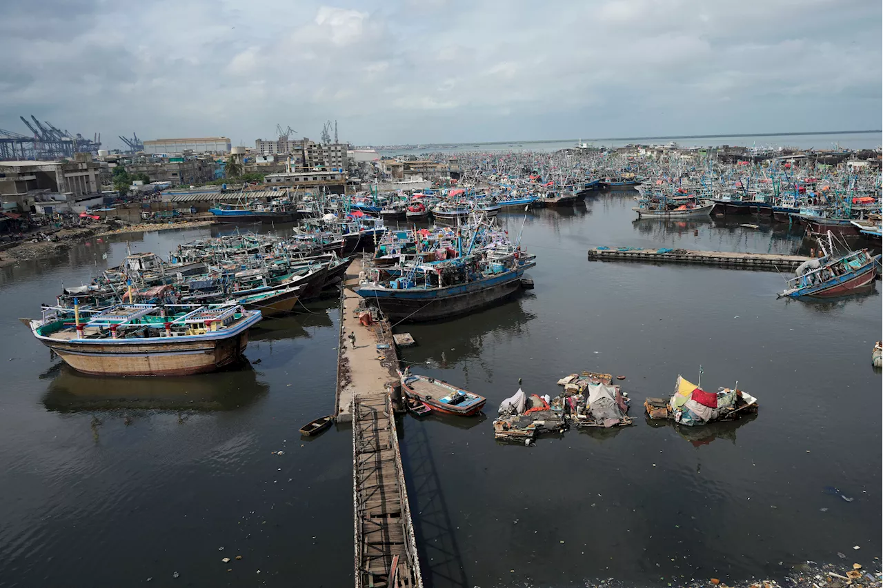 A storm developing in the Arabian Sea prompts Pakistani officials to shut schools in Karachi