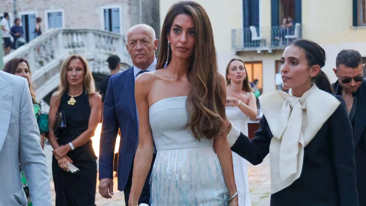 Amal Clooney Is The Lady Of The Lido In A Mermaid-Like Bach Mai Gown