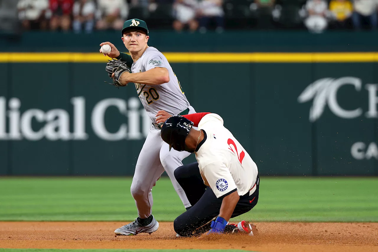 Rooker homers twice, A's beat Rangers 9-2 for first consecutive winning months since 2021