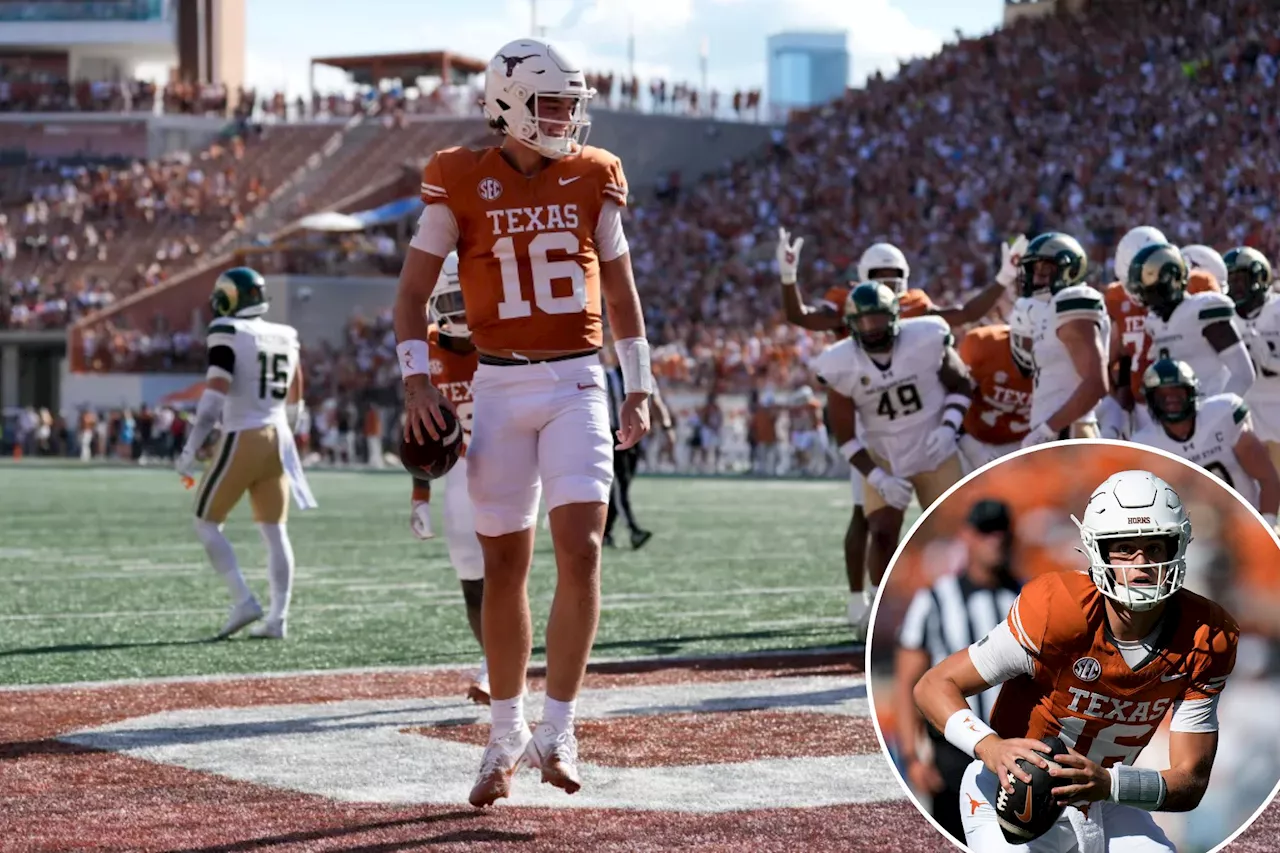 Arch Manning throws first college touchdown, runs for another in impressive Texas showing