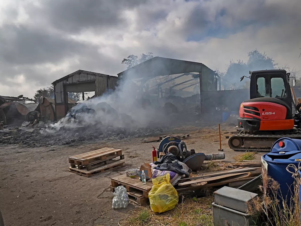 Photographs reveal devastation after fire burns through the night at Shropshire dairy farm