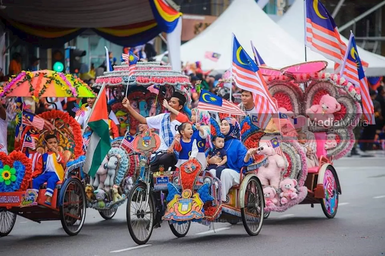 Hujan bukan penghalang sambutan Hari Kebangsaan di Banda Hilir