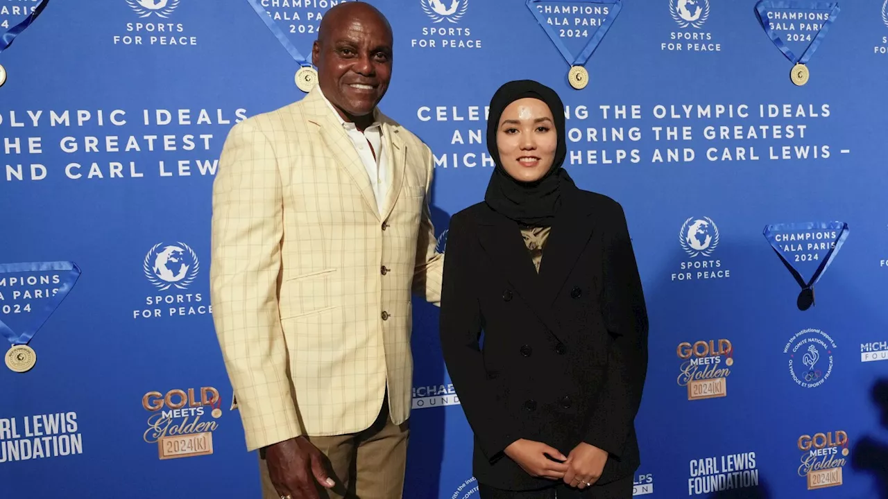 Iconic Olympians Carl Lewis and Michael Phelps honored at gala for their philanthropy contributions