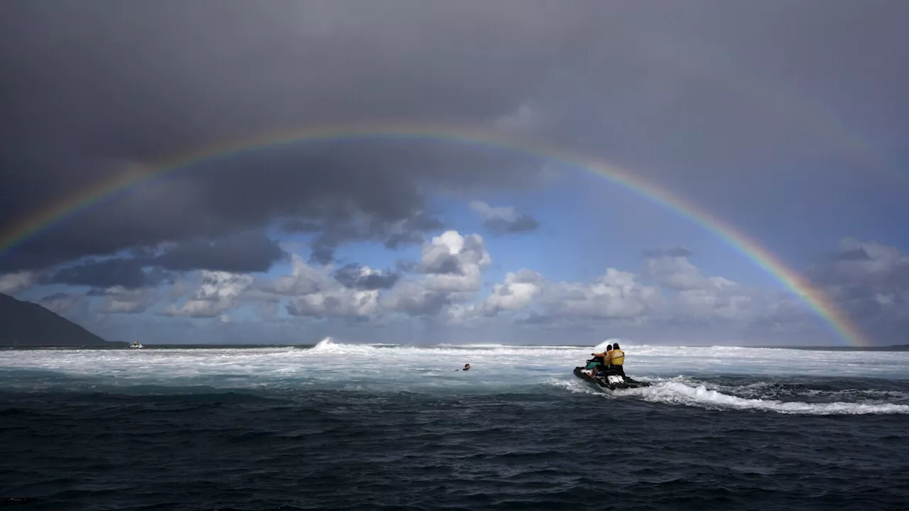 Paris Olympics water safety patrol 'like guardian angels' during surfing competition in Tahiti