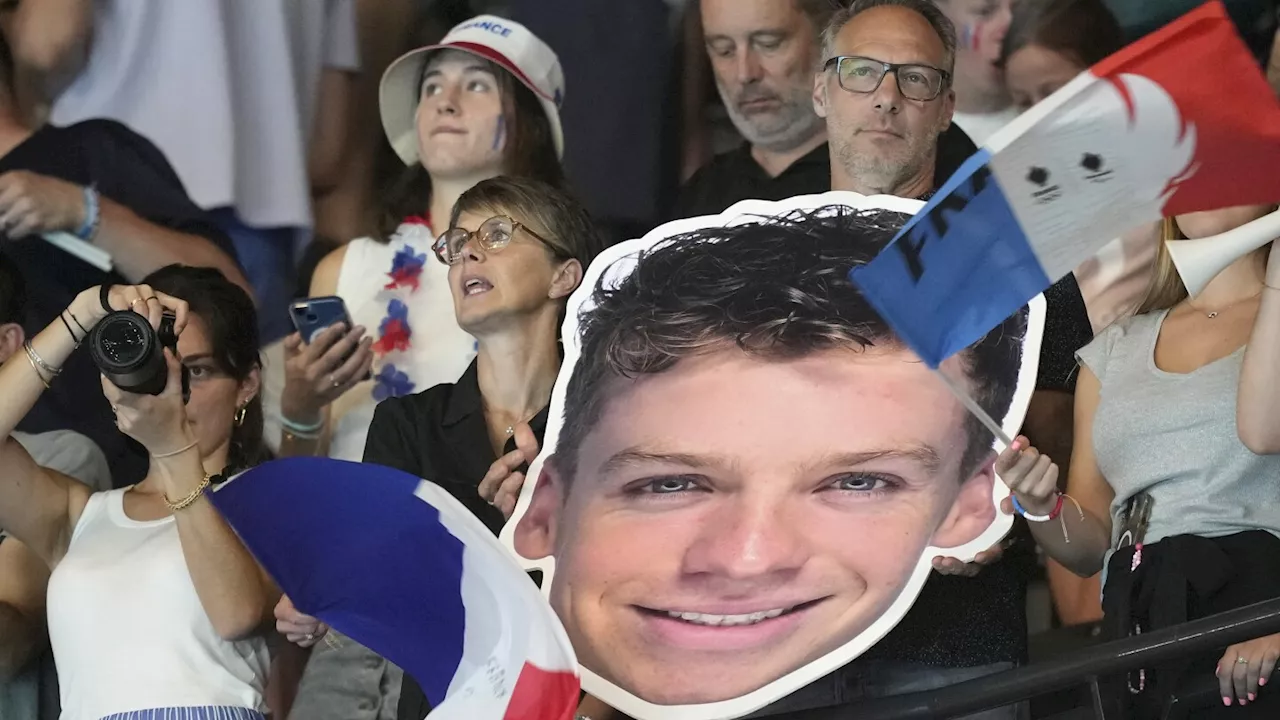 When Léon Marchand swims, nearly all of France watches - even fans at other Olympic events