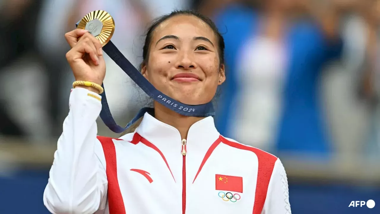 Tennis China's Zheng Qinwen makes history with Olympic tennis singles