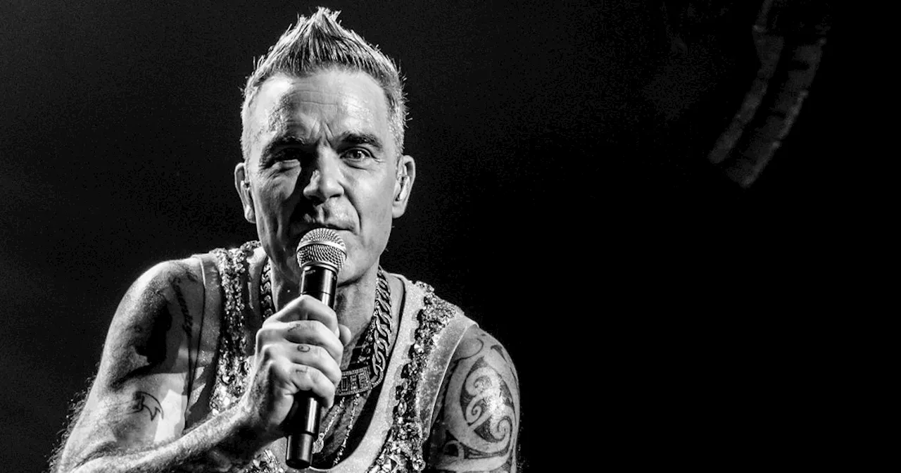 Scots music merch seller tours world with Robbie Williams as go-to photographer