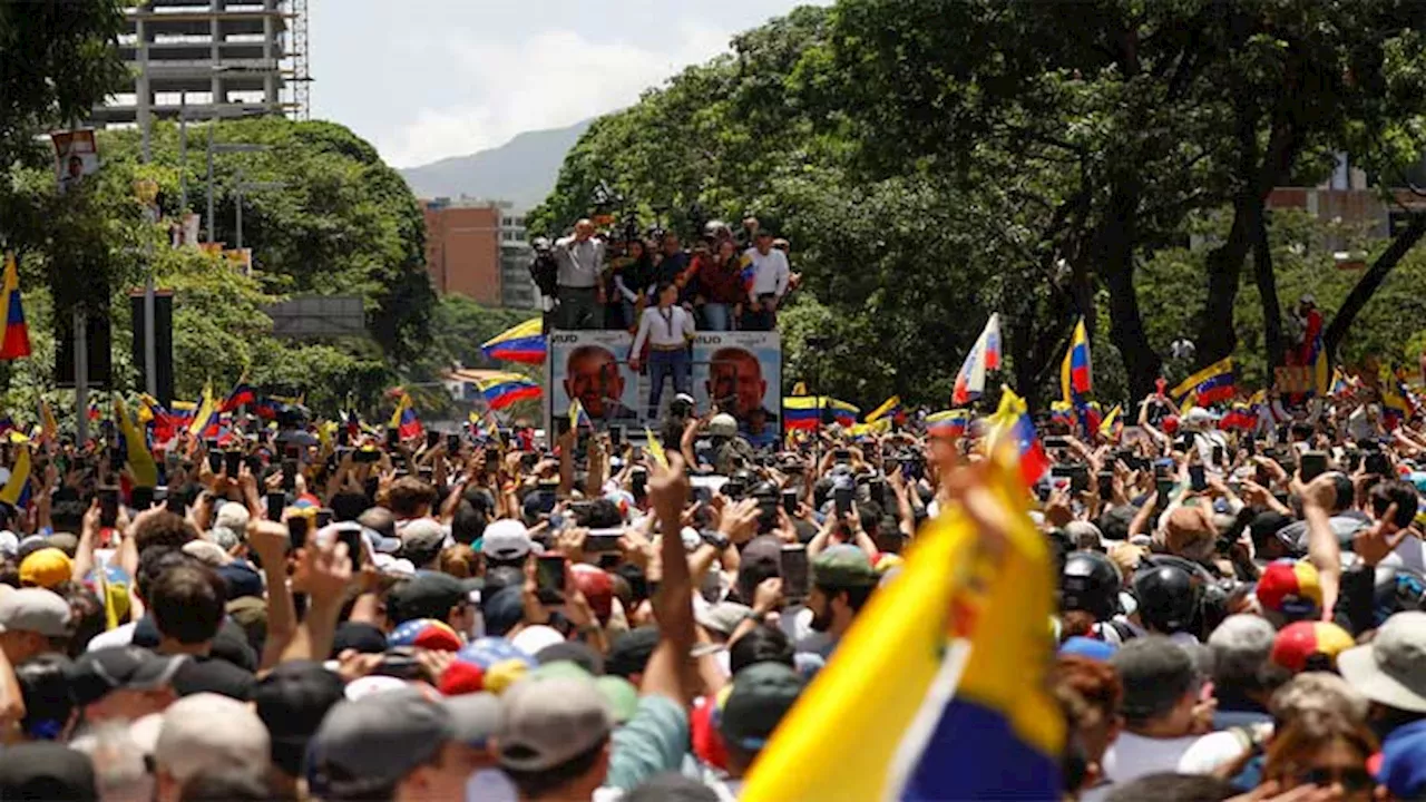 Venezuelans march over contested election, number of detained rises