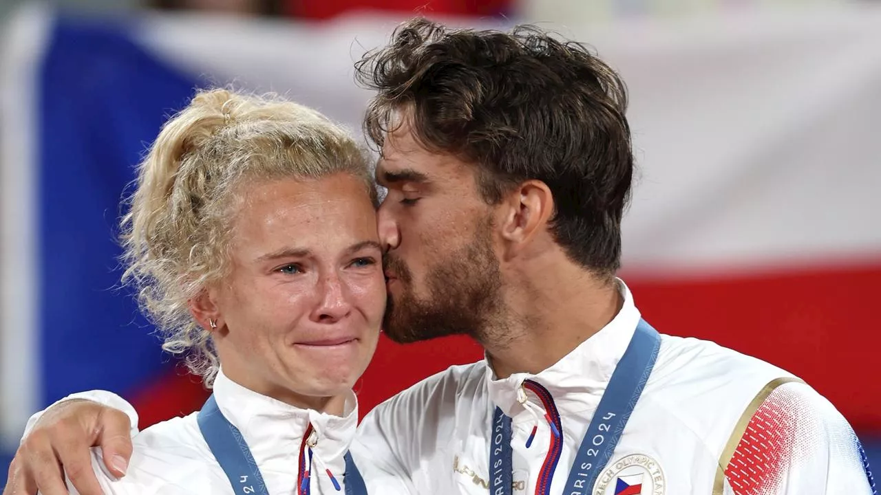 ‘We are professionals’: Couple teams up to win Olympic gold... weeks after breaking up