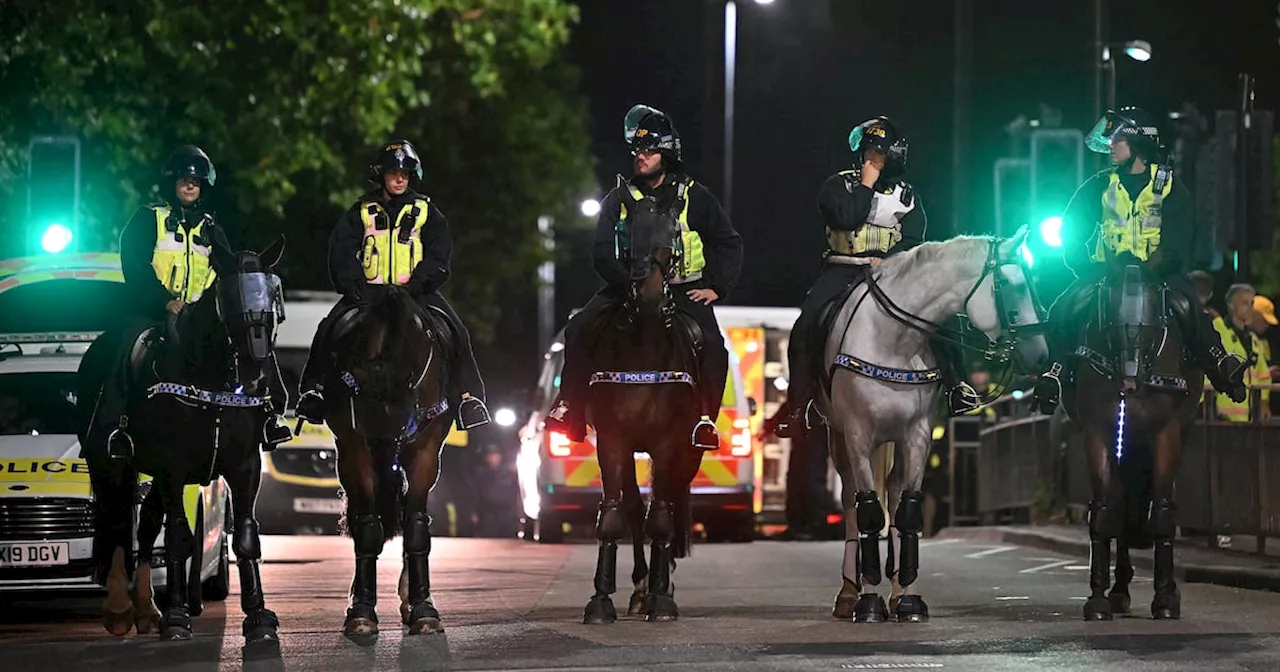 UK riots: Demonstrators attack police and target hotel as unrest continues