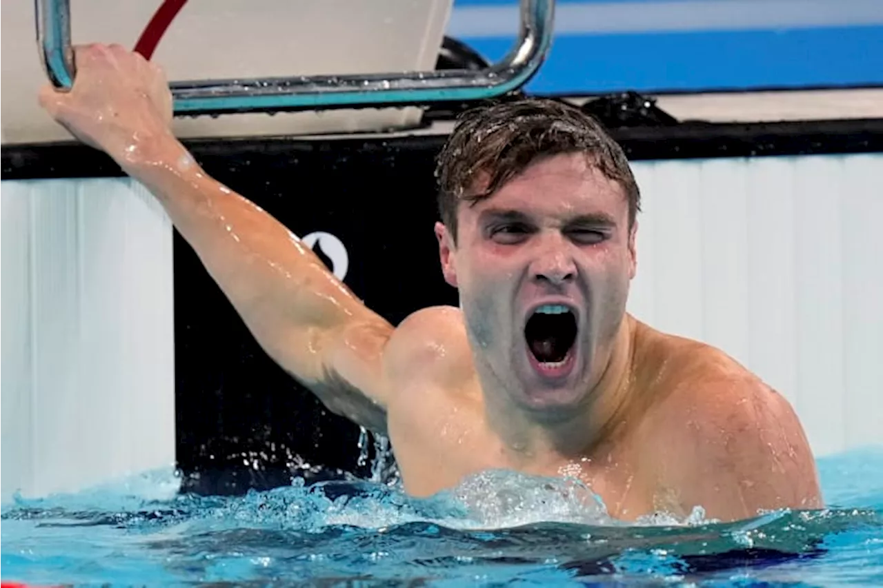 American Bobby Finke sets 1,500 freestyle world record on final night of Olympic swimming