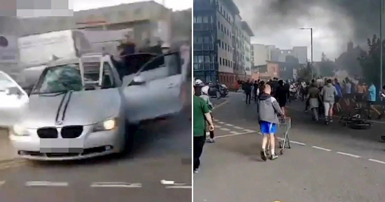 Racist Hull rioters pull Asian man out of car and smash it up