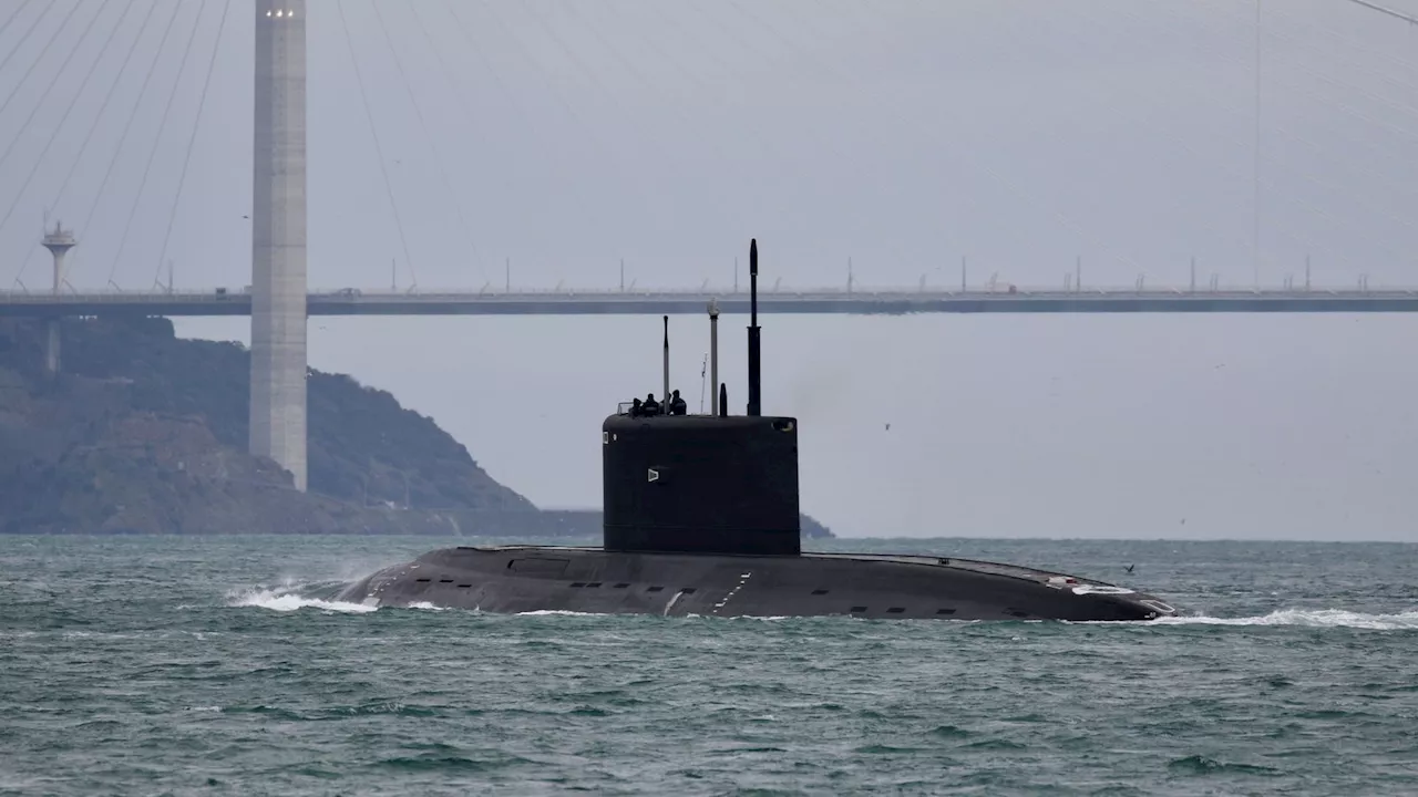 Ukraine says it has sunk a Russian submarine before launching drone strikes across the border