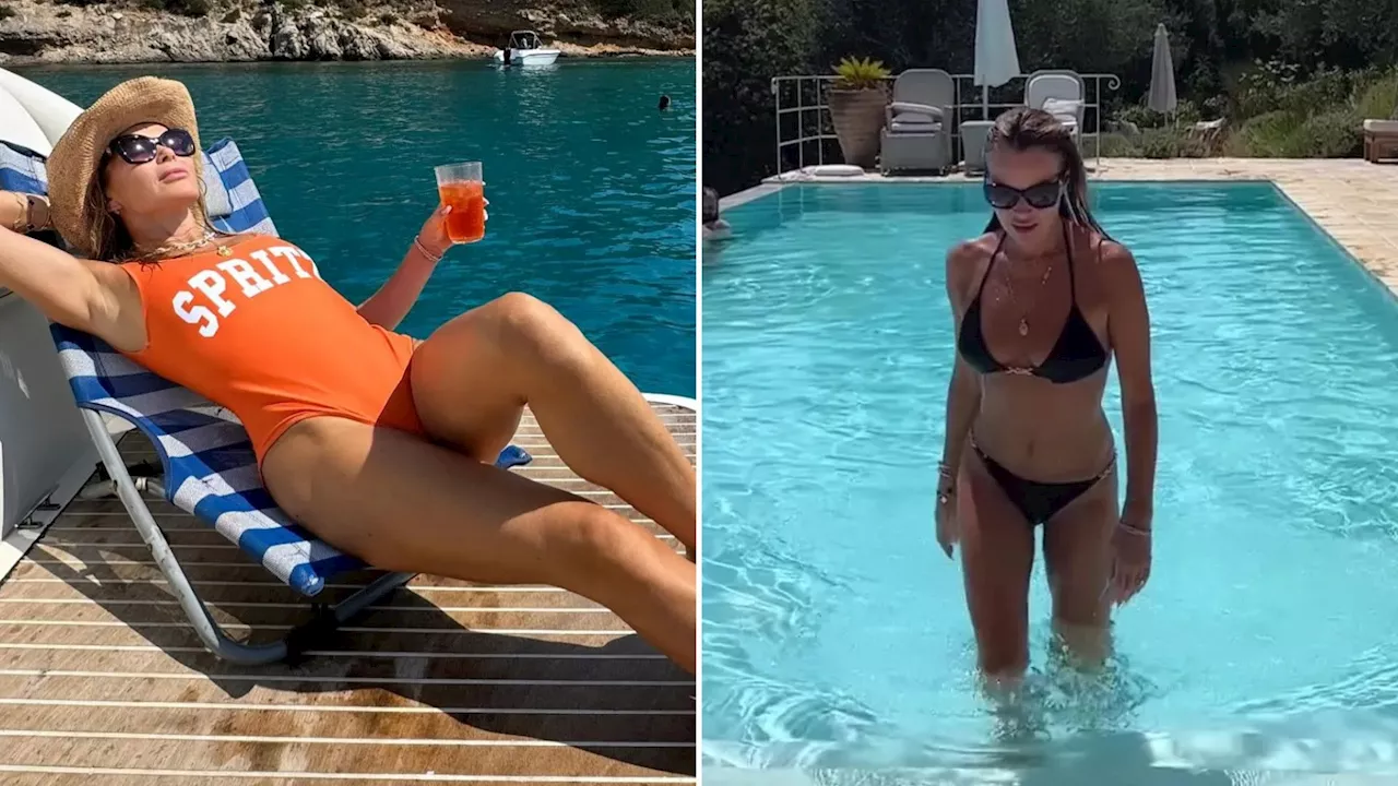 Amanda Holden, 53, sizzles as she sips cocktail and sunbathes on a boat in Corfu...