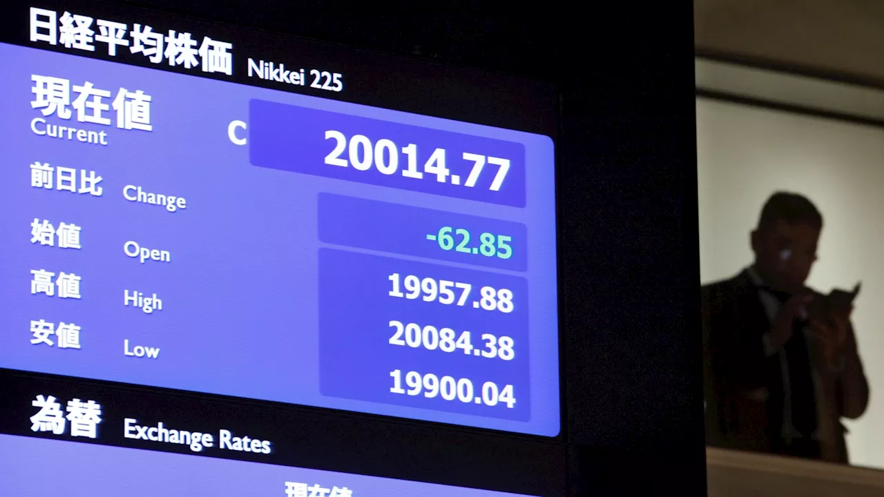 Japan's Nikkei 225 stock index sinks 12.4% as investors dump a wide range of shares