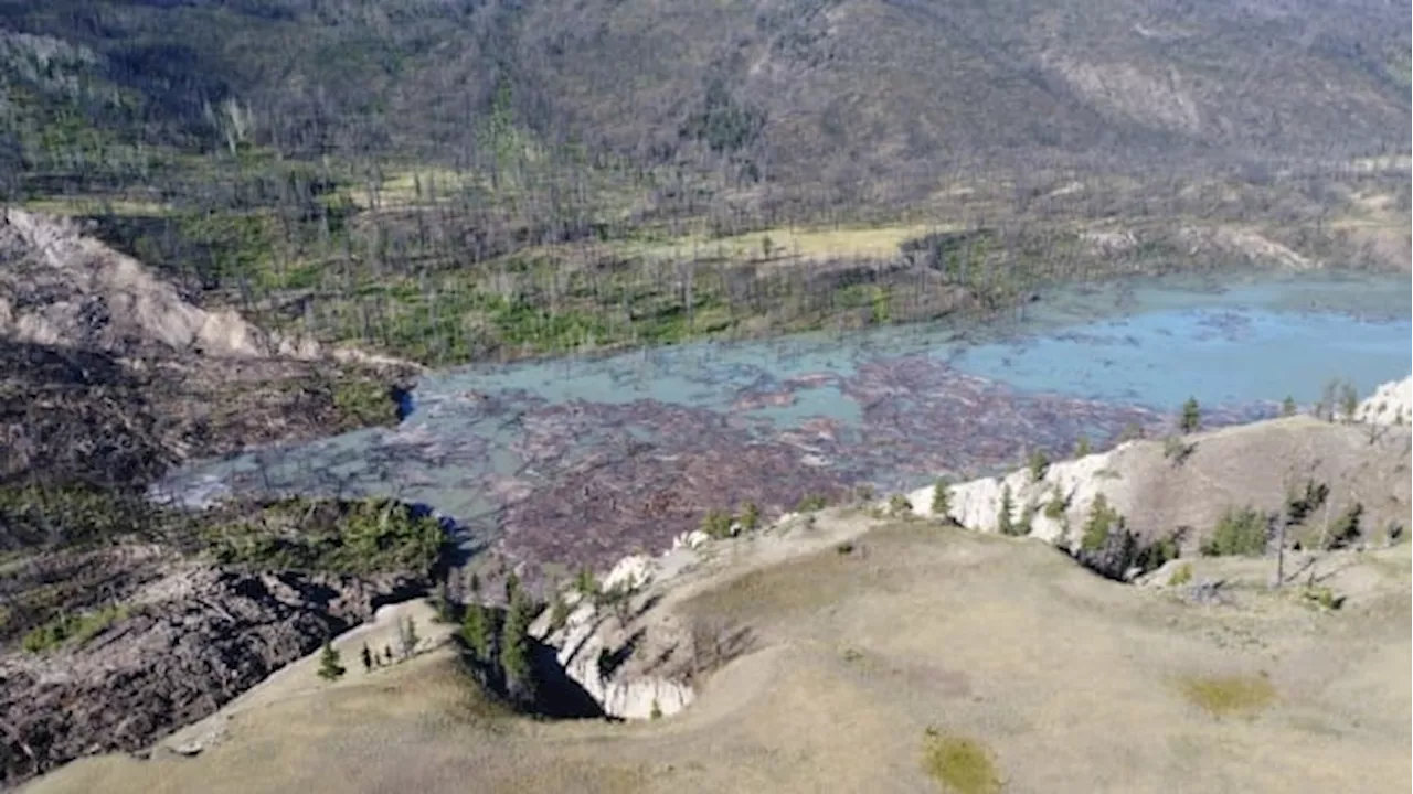 Water begins spilling over landslide damming Chilcotin River