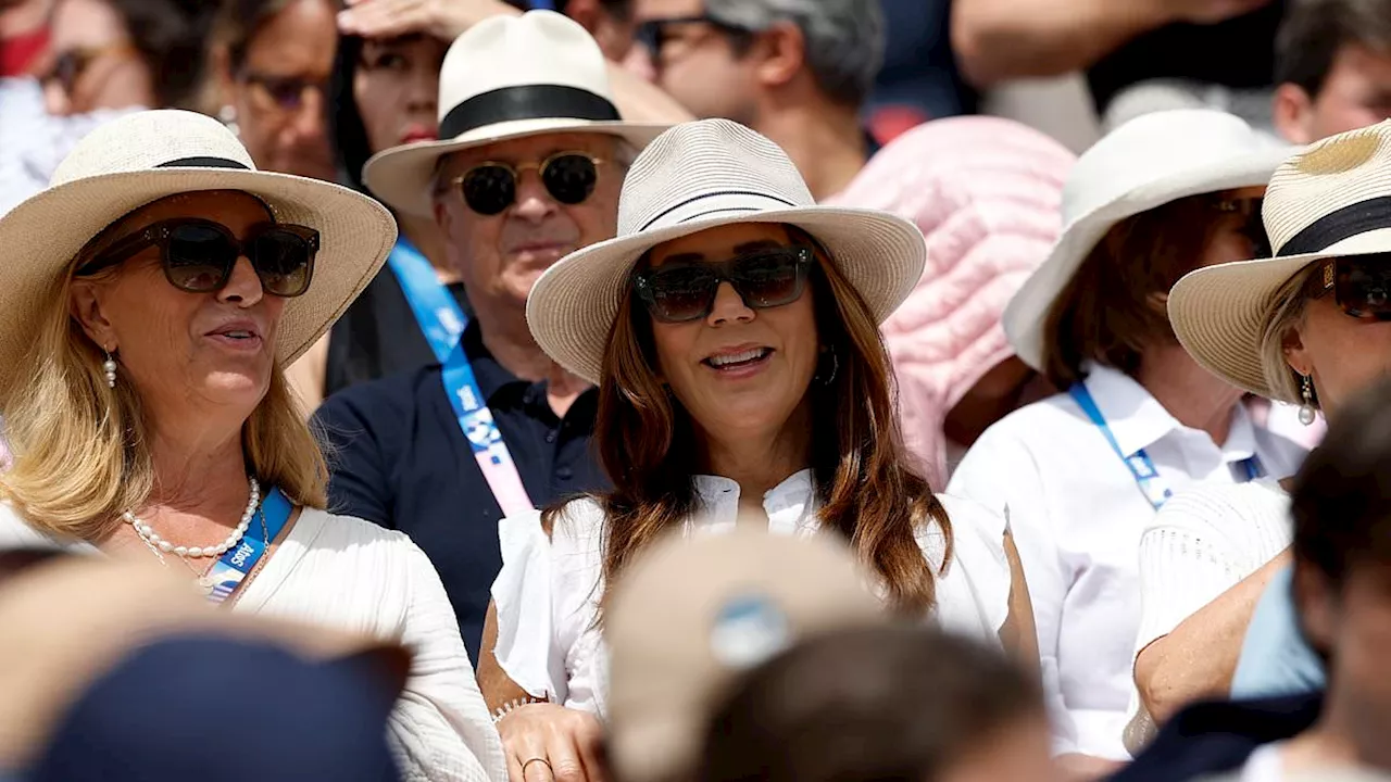 Queen Mary of Denmark looks cool in white as she attends the Olympic Dressage Individual Grand Prix...