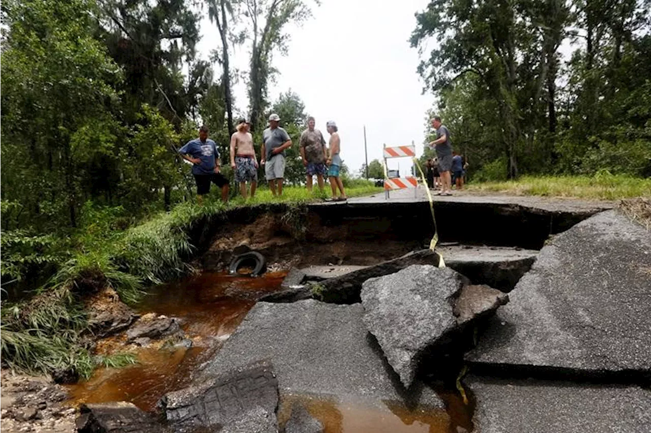 Debby, now a tropical storm, soaks northern Florida, kills at least 4