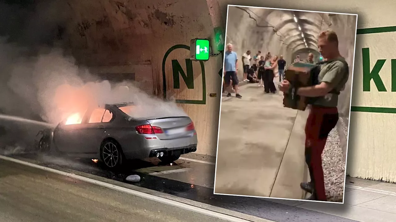 Feuer-Auto im Tunnel: Musik-Soldaten verhindern Panik