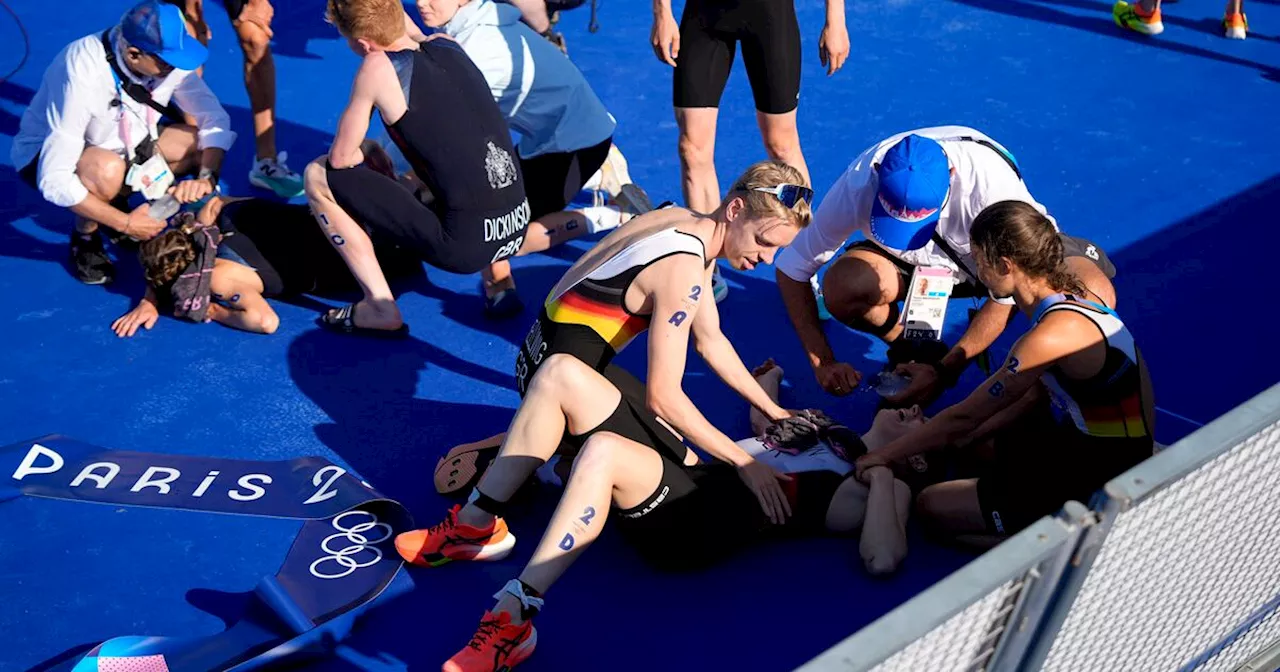 Olympic triathlon mixed relay goes ahead with swims in the Seine amid water quality concerns