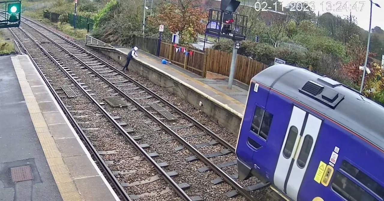 Horrifying moment boy leaps onto railway as train approaches caught on CCTV