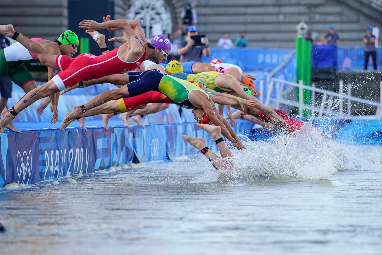 Olympic triathlon mixed relay goes ahead with swims in the Seine amid water quality concerns