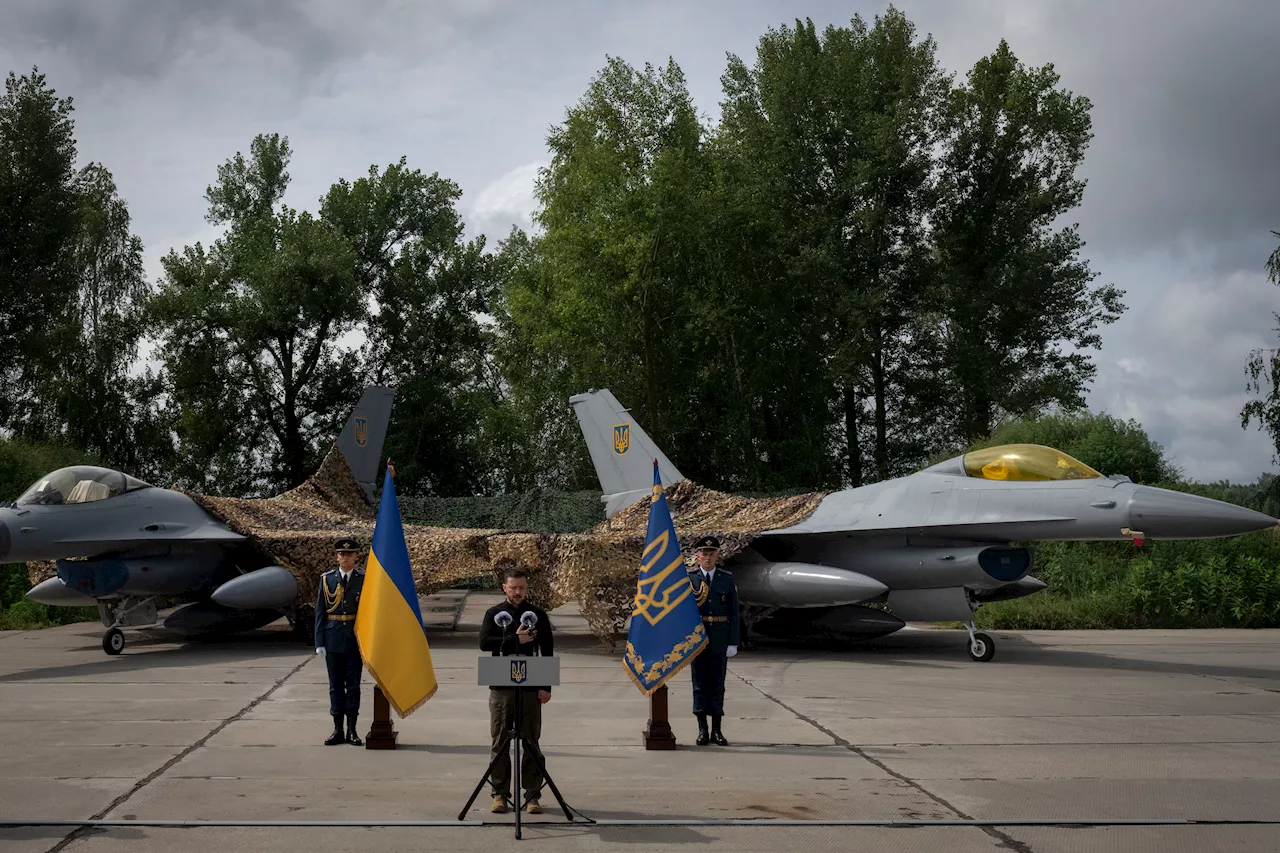 Ukraine's Zelenskyy displays newly arrived F-16 fighter jets to combat Russia in the air