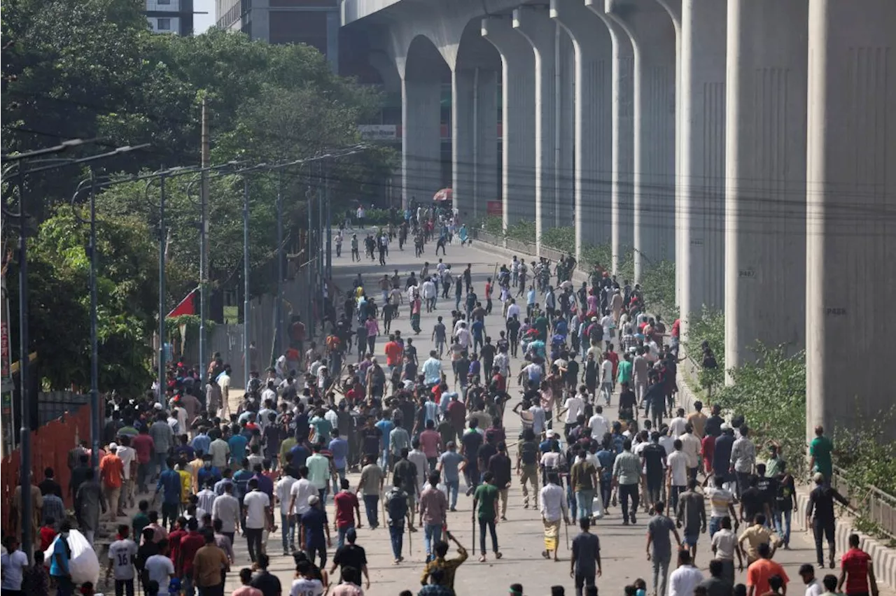 Bangladesh protesters call for march to Dhaka in defiance of curfew