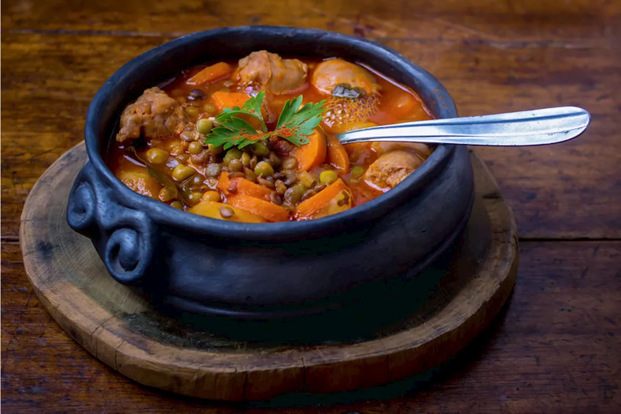 Slow cooked beef sausage and lentil stew in a tomato base