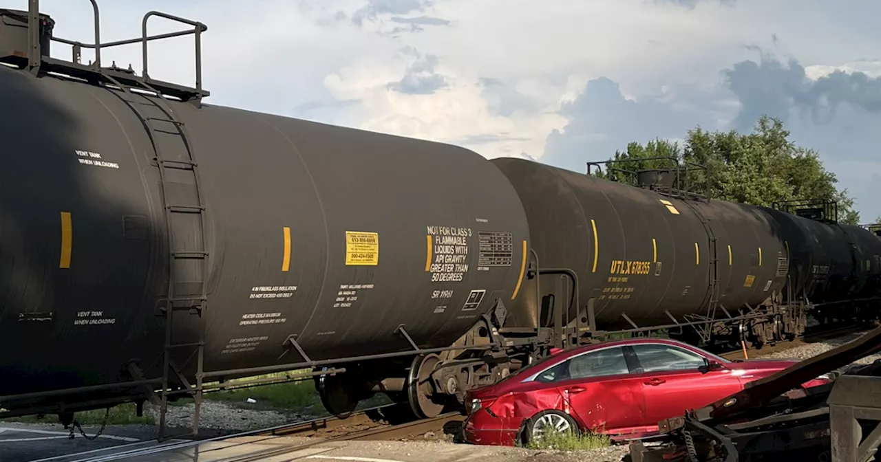 Freight train, car hauler truck involved in crash in Plainfield, Illinois