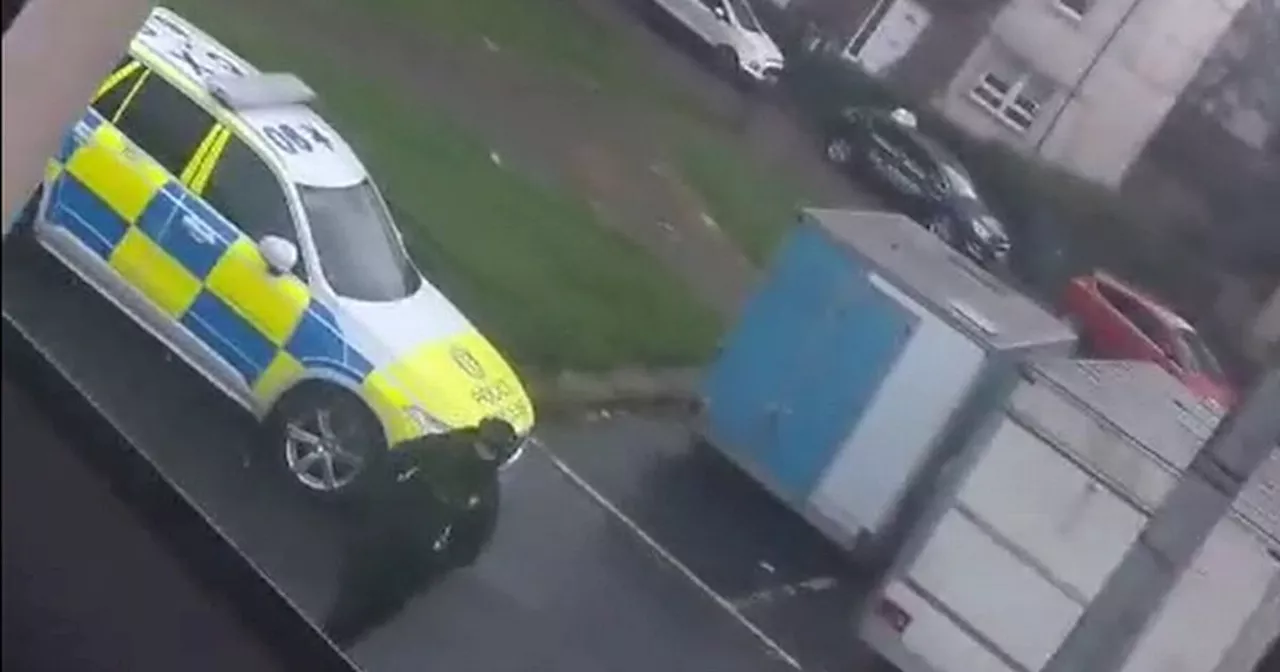 Woman 'attacked with machete' on Glasgow street as armed police swam the area