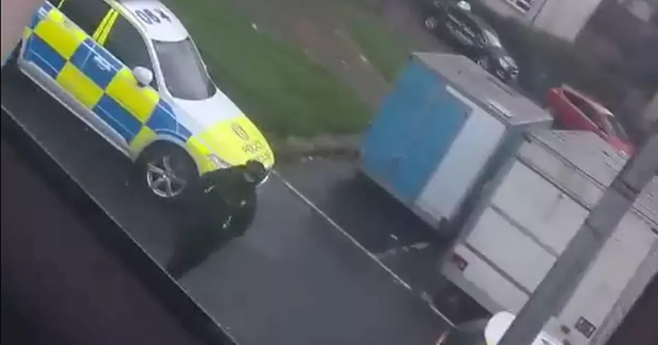 Armed police swarm east Glasgow street after woman 'attacked with machete'