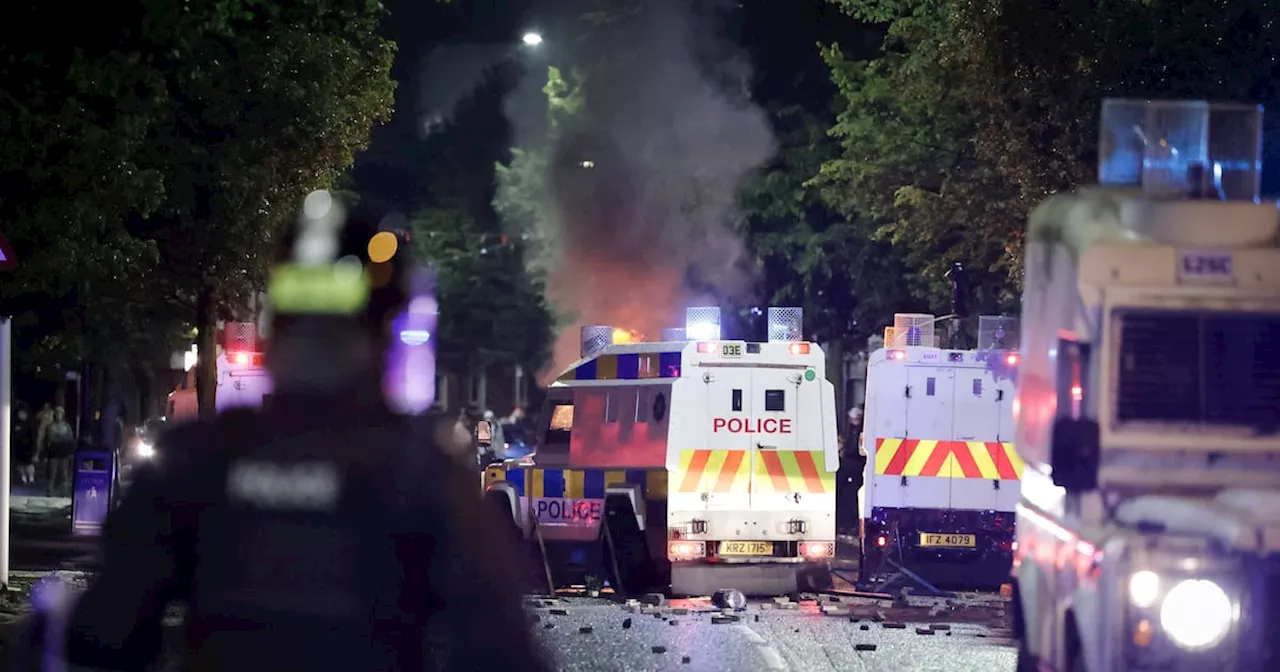 Police attacked in Belfast and suspected hate crime victim in serious condition