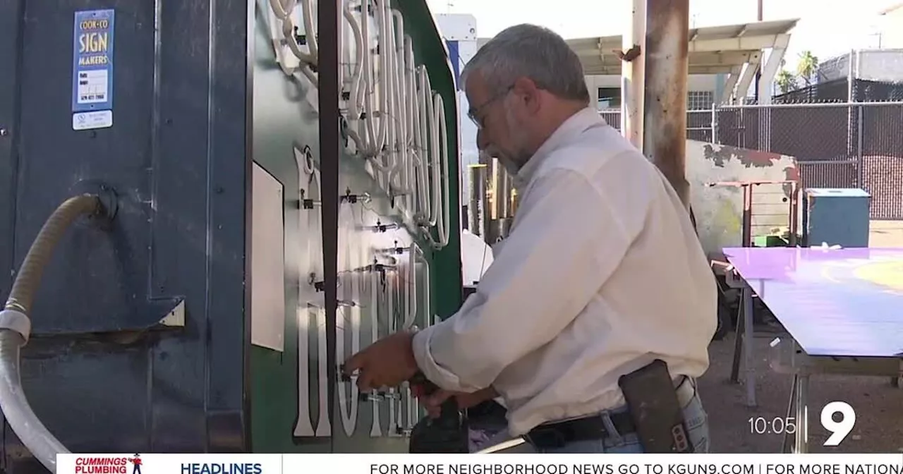 Midtown business owner restoring historic neon signs damaged by monsoon