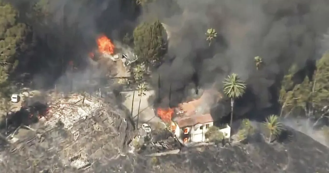 Fast-moving wildfire in San Bernardino engulfs hillside homes